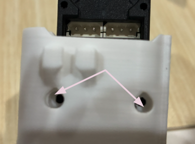 Filament covering screw holes